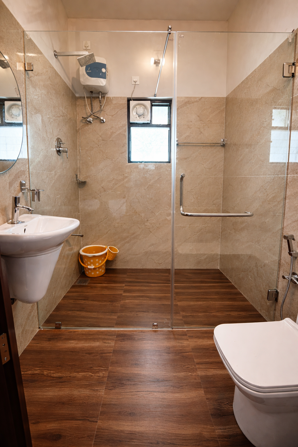 Nisargam washroom with modern fittings and clean premium finish